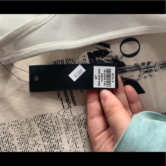 Sleeveless white too. Brand new. - Picture 3 of 4